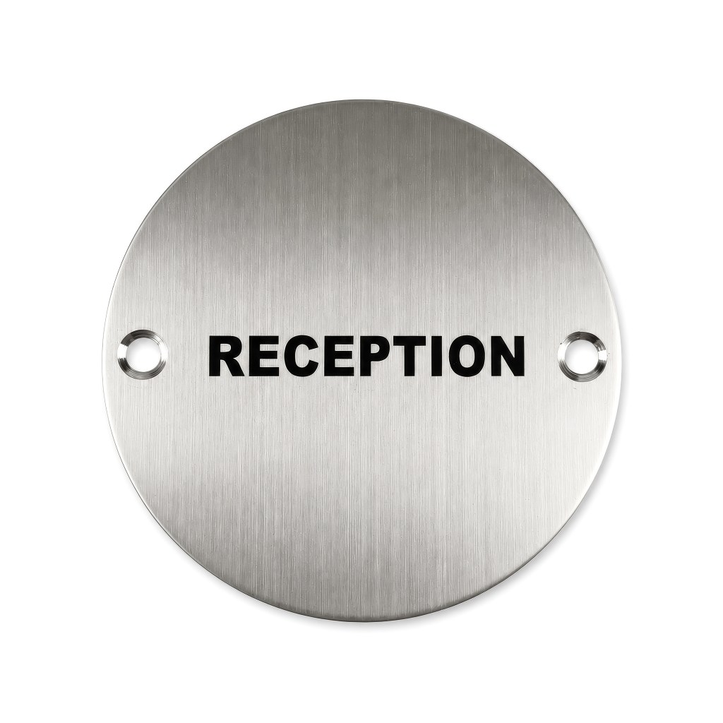 Reception door disc in metal finish.